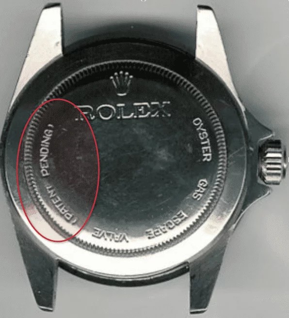 This early Rolex watch is marked Patent Pending on its base.